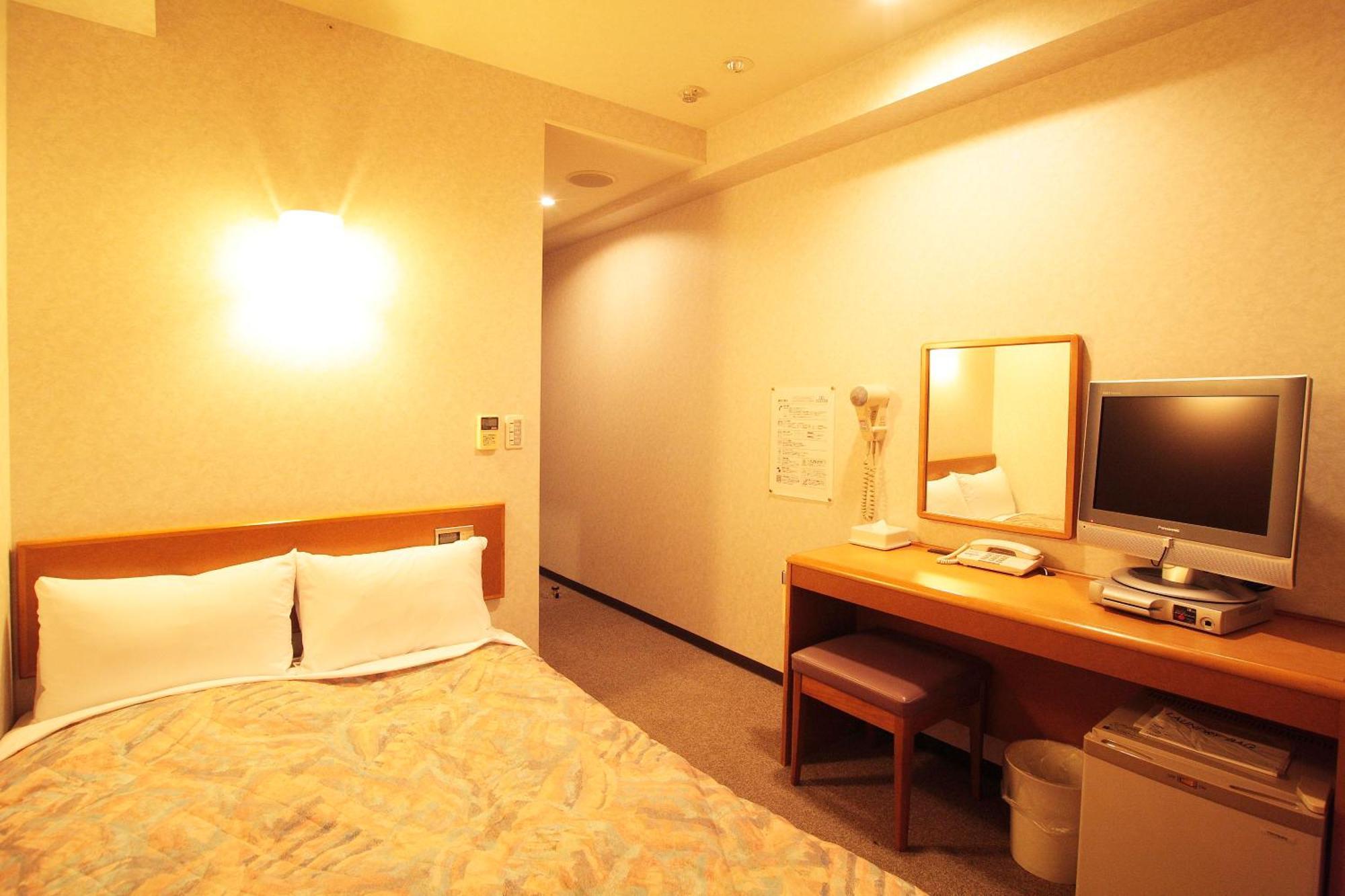 Hotel New Budget Sapporo Quarto foto