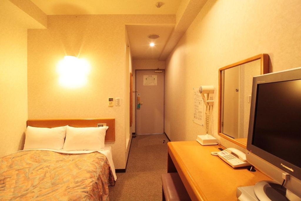 Hotel New Budget Sapporo Quarto foto